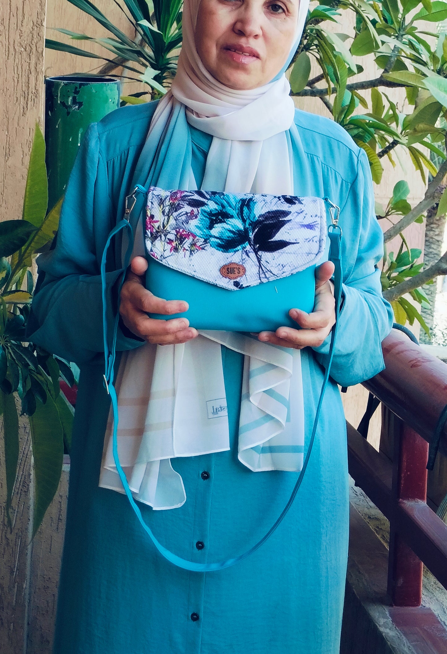 Aqua color small cross bag