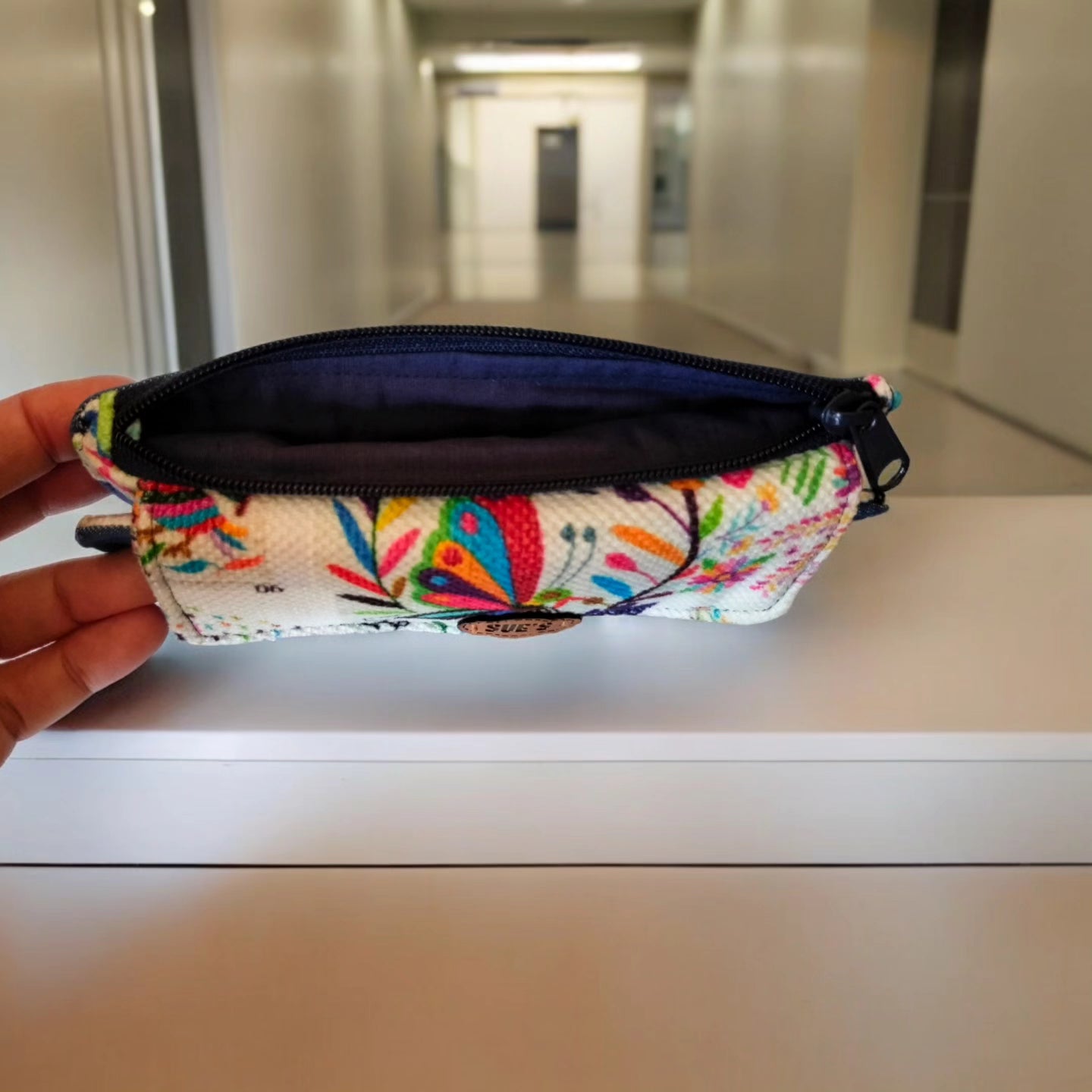Black , embroidery flap trifold wallet