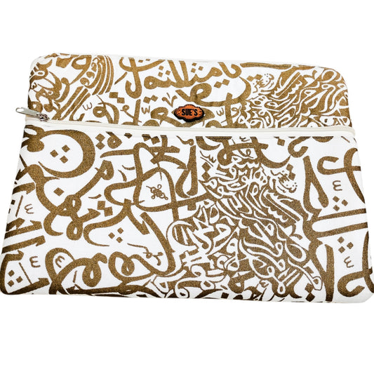 Suepatchwork handmade 13-inch laptop sleeve featuring white fabric with elegant gold Arabic calligraphy and zipper