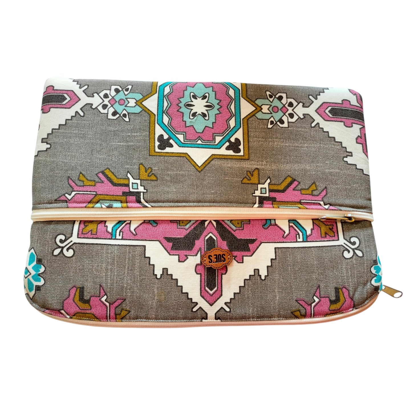 Suepatchwork handmade 13-inch laptop sleeve in grey fabric with a colourful geometric pattern and leather logo tag