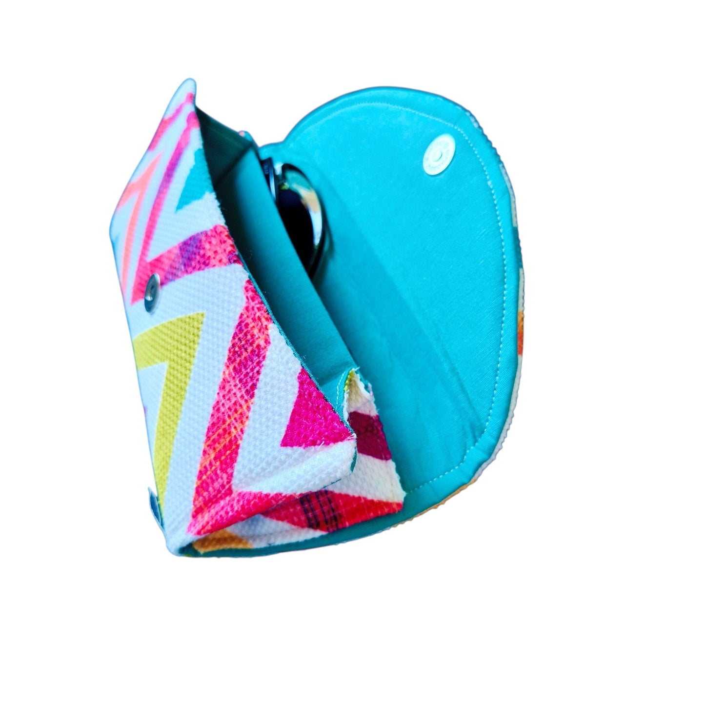 Suepatchwork handmade double glasses case featuring a vibrant zigzag pattern in pink, yellow, and blue fabric.