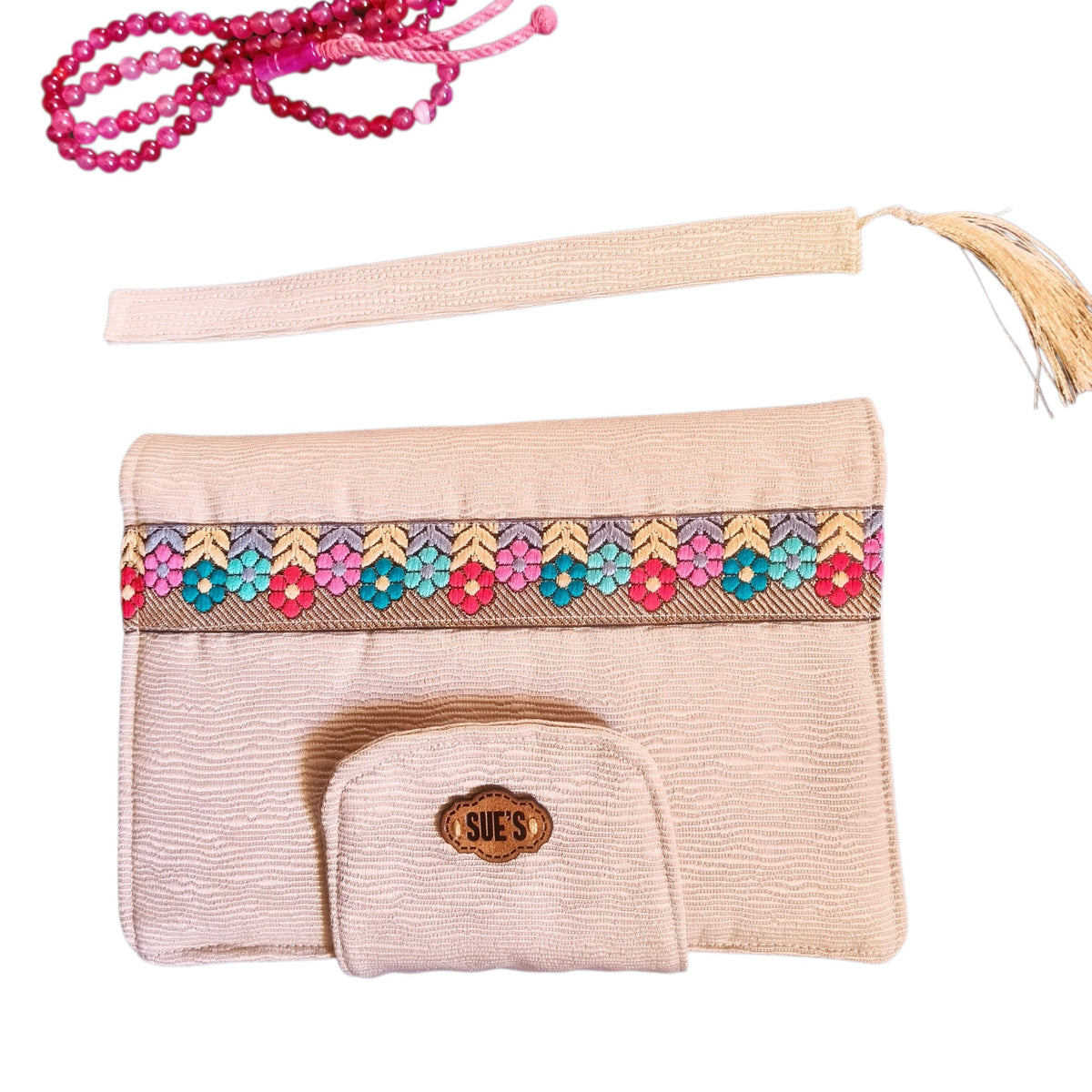 Suepatchwork handmade beige fabric Quran cover featuring colorful floral embroidery and a matching tassel bookmark