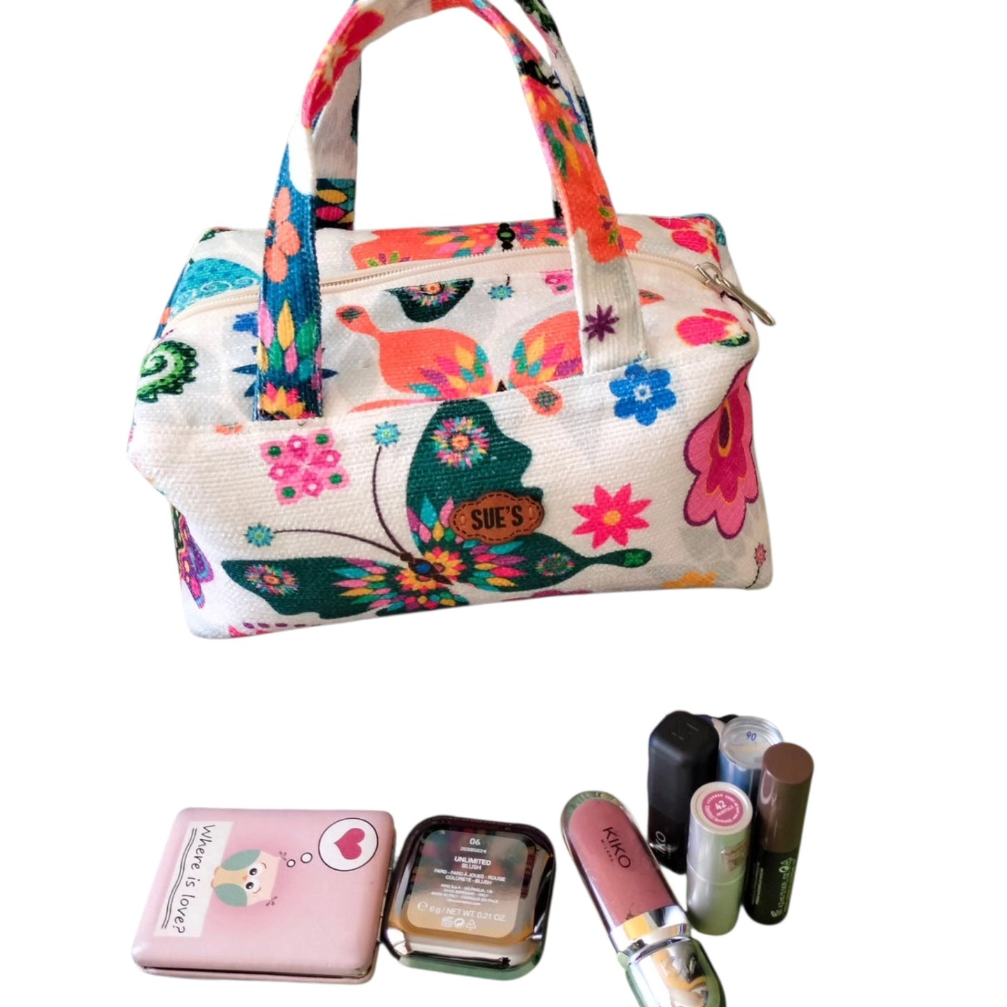 Suepatchwork handmade butterfly print fabric makeup bag with top handle and zip closure, shown with cosmetic items.