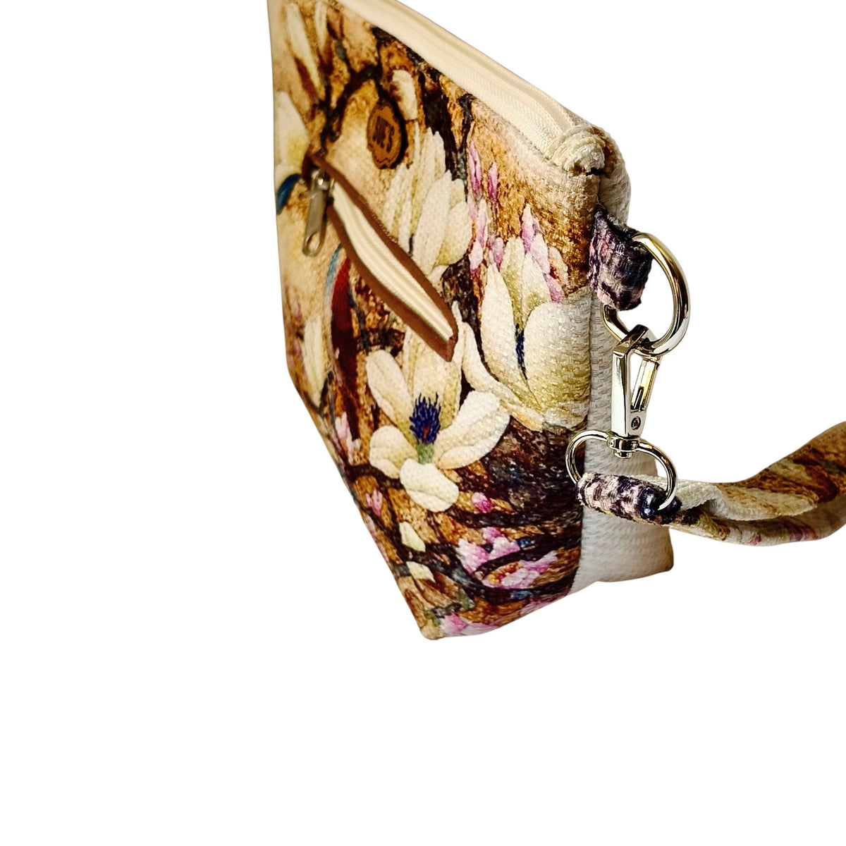 Suepatchwork floral bird print fabric clutch with exterior zip pocket, cotton lining, and detachable strap.