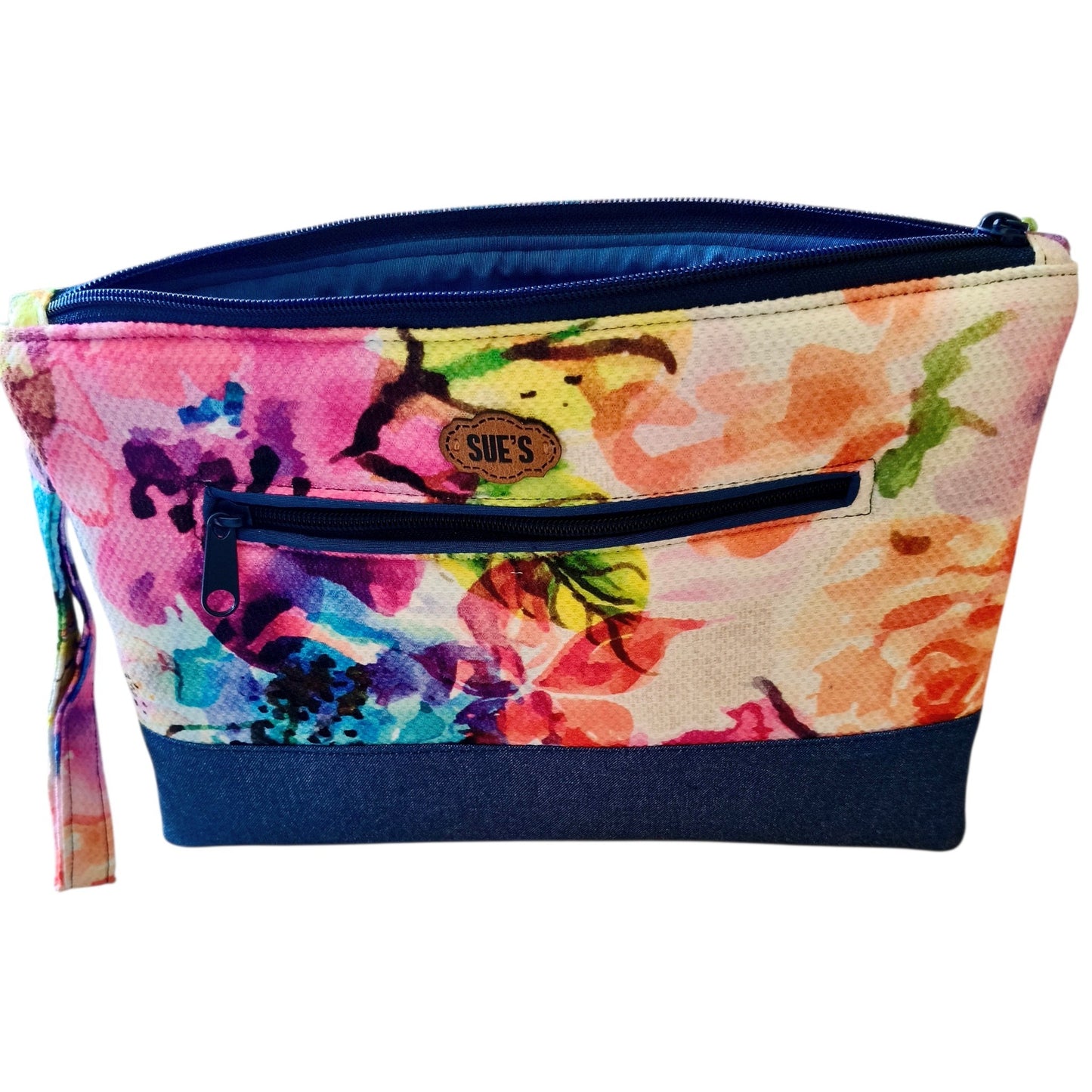 Suepatchwork handmade floral fabric clutch with a navy blue base, exterior zip pocket, and soft cotton lining.