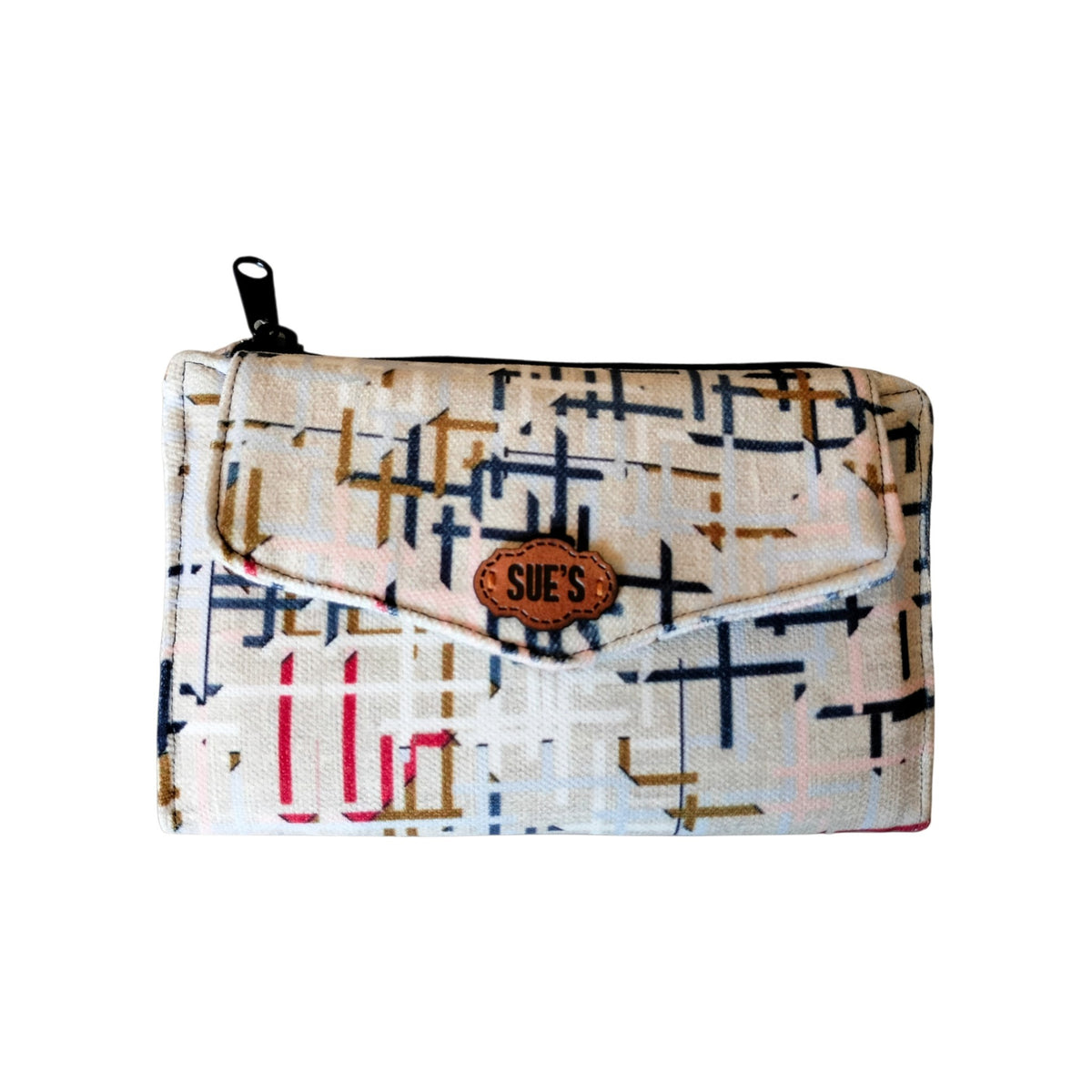 Suepatchwork trifold wallet in cream fabric with a geometric grid pattern, featuring a leather logo and zipper pocket.