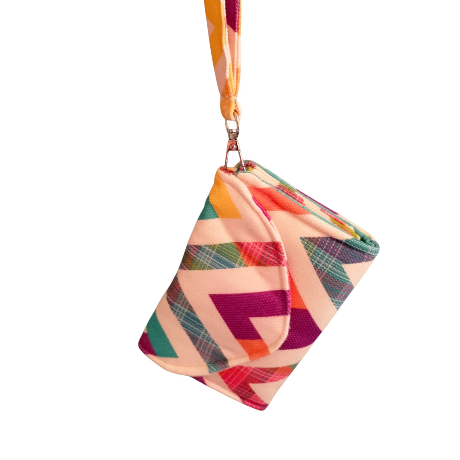 Suepatchwork handmade small wallet with a colourful geometric zigzag pattern and a detachable wrist strap