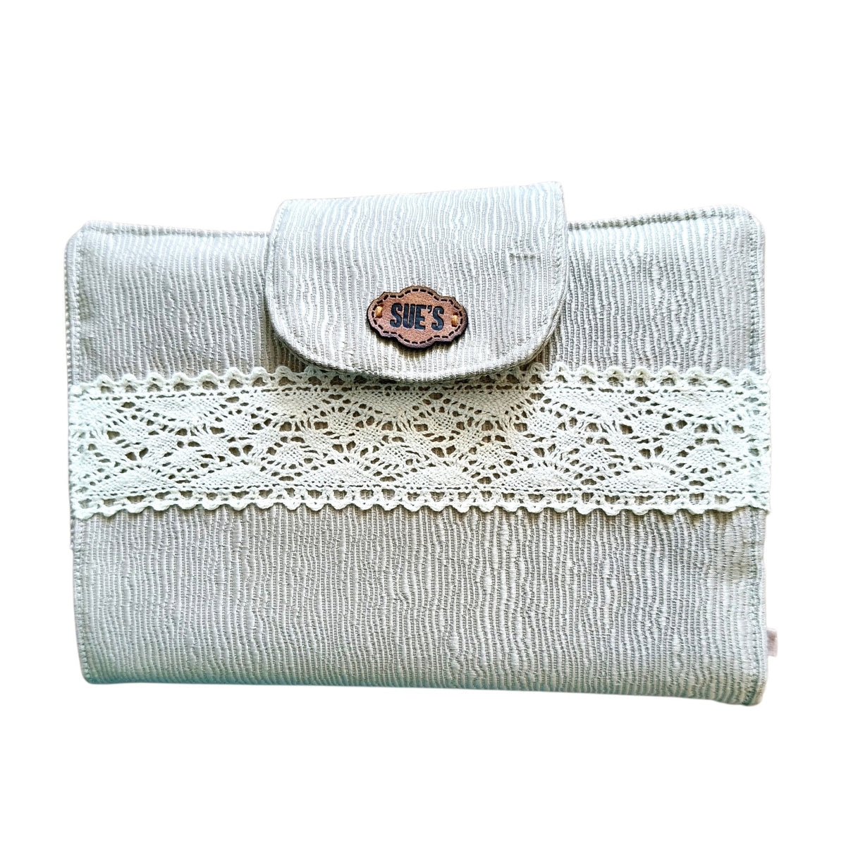 Suepatchwork gold fabric Quran cover with delicate lace trim and a branded leather tag, 20x14cm size.