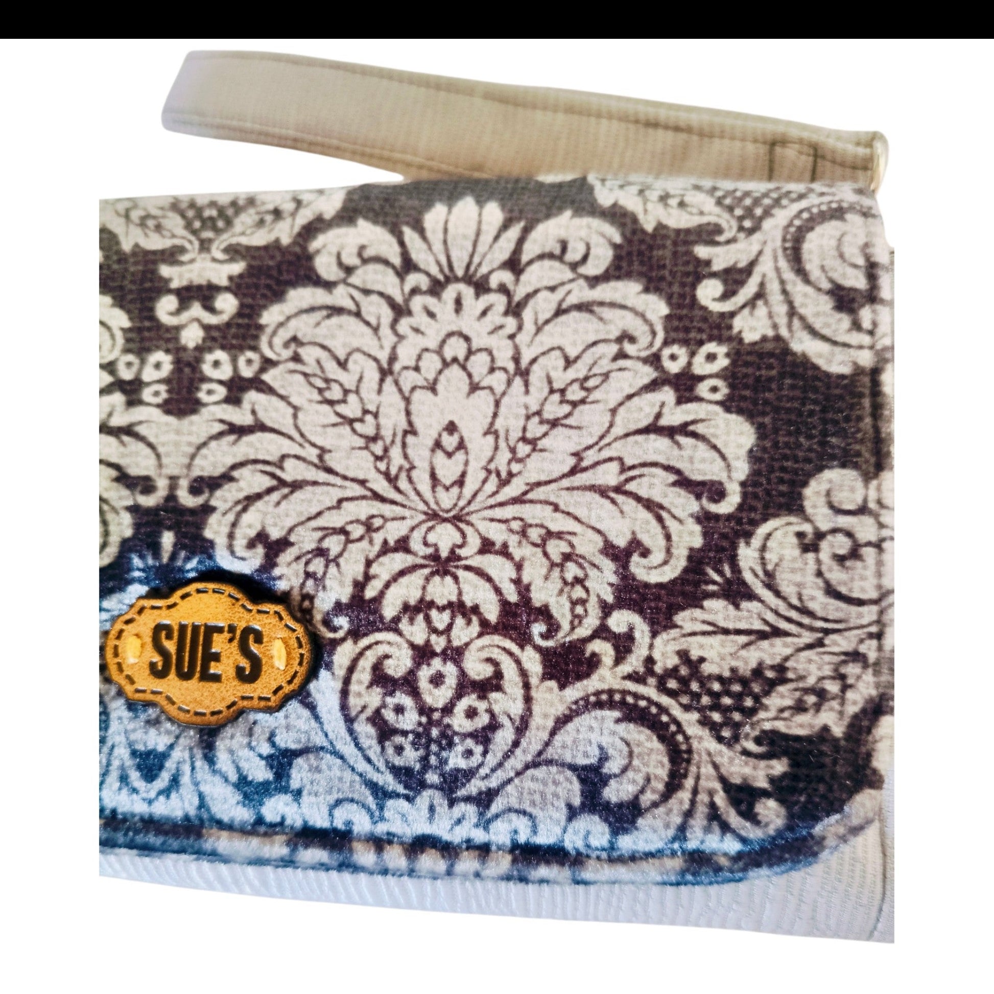 Suepatchwork gray large wallet with intricate damask pattern and branded leather tag for daily organization
