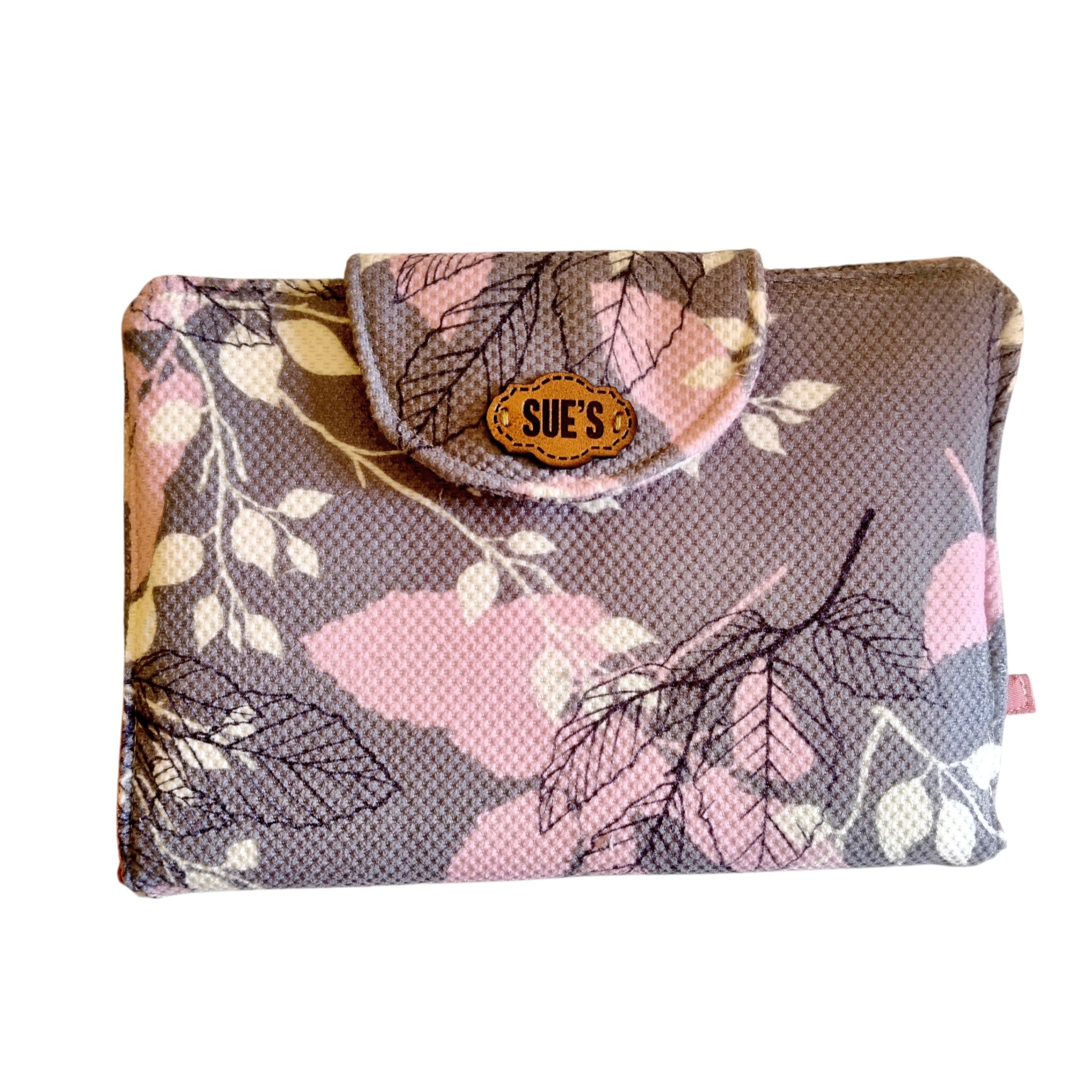 Suepatchwork gray fabric Quran cover with pink floral pattern and a branded leather tab, size 20x14cm.