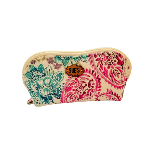 Suepatchwork handcrafted makeup bag with a curved shape, featuring a colourful floral Kashmir paisley print.