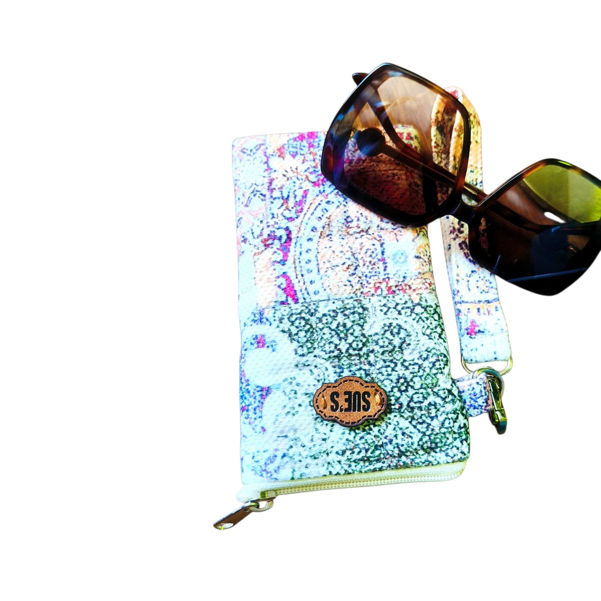 Suepatchwork handmade patchwork quilted fabric glasses case with a zipper and wrist strap, featuring a floral pattern.