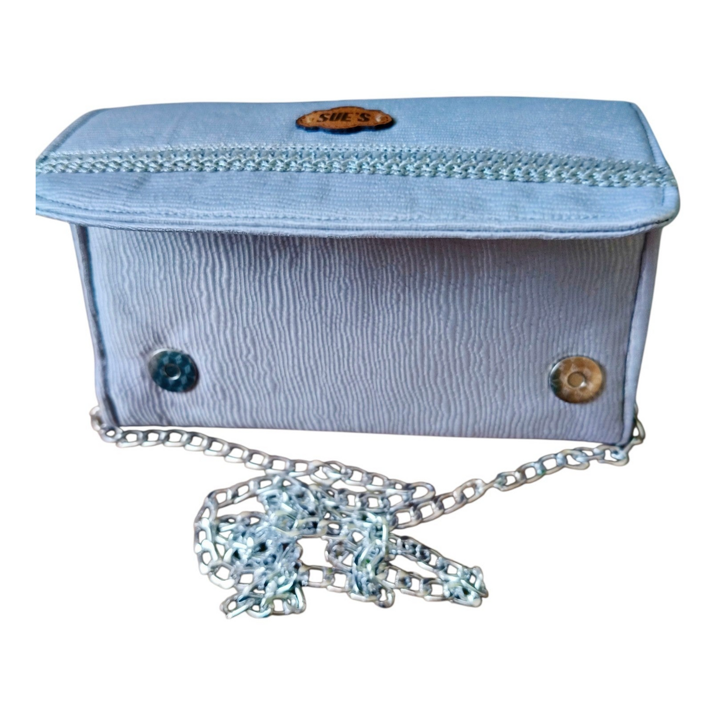 Suepatchwork silver evening wallet with a detachable chain strap, featuring a textured finish and branded logo tag.