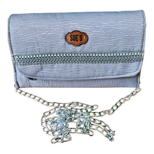 Suepatchwork silver evening wallet with a detachable chain strap and a branded leather logo patch