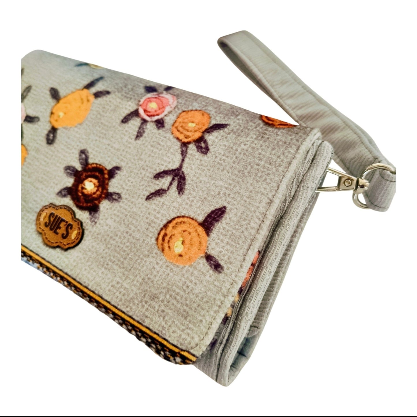 Suepatchwork silver gray large wallet with floral embroidery, wrist strap, and detailed handmade finish.